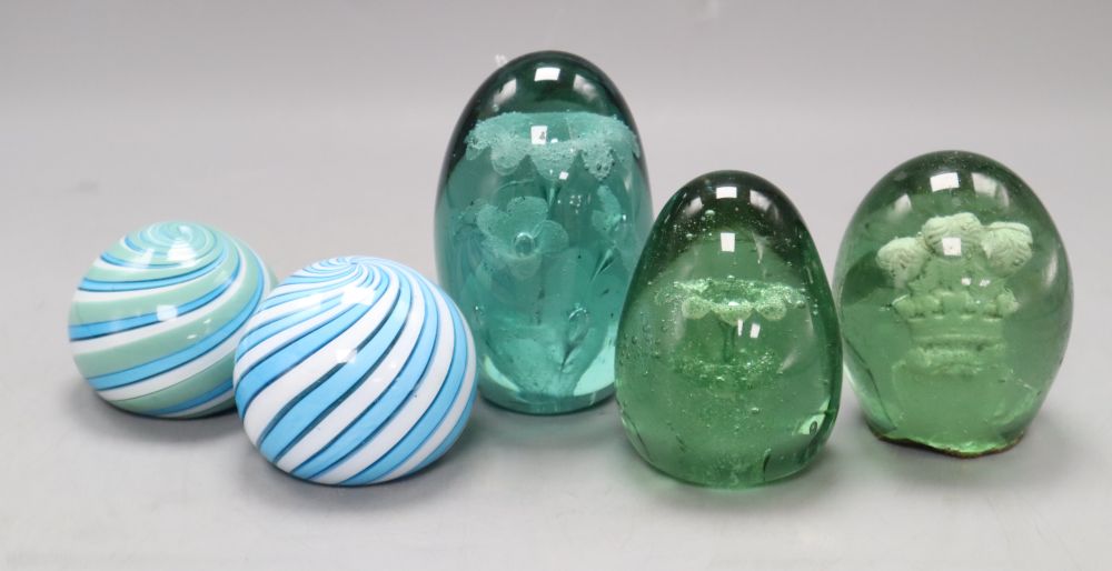 Two glass swirl paperweights and three glass dump paperweights, one with Prince of Wales feathers sulphide, height 6cm - 11.5cm